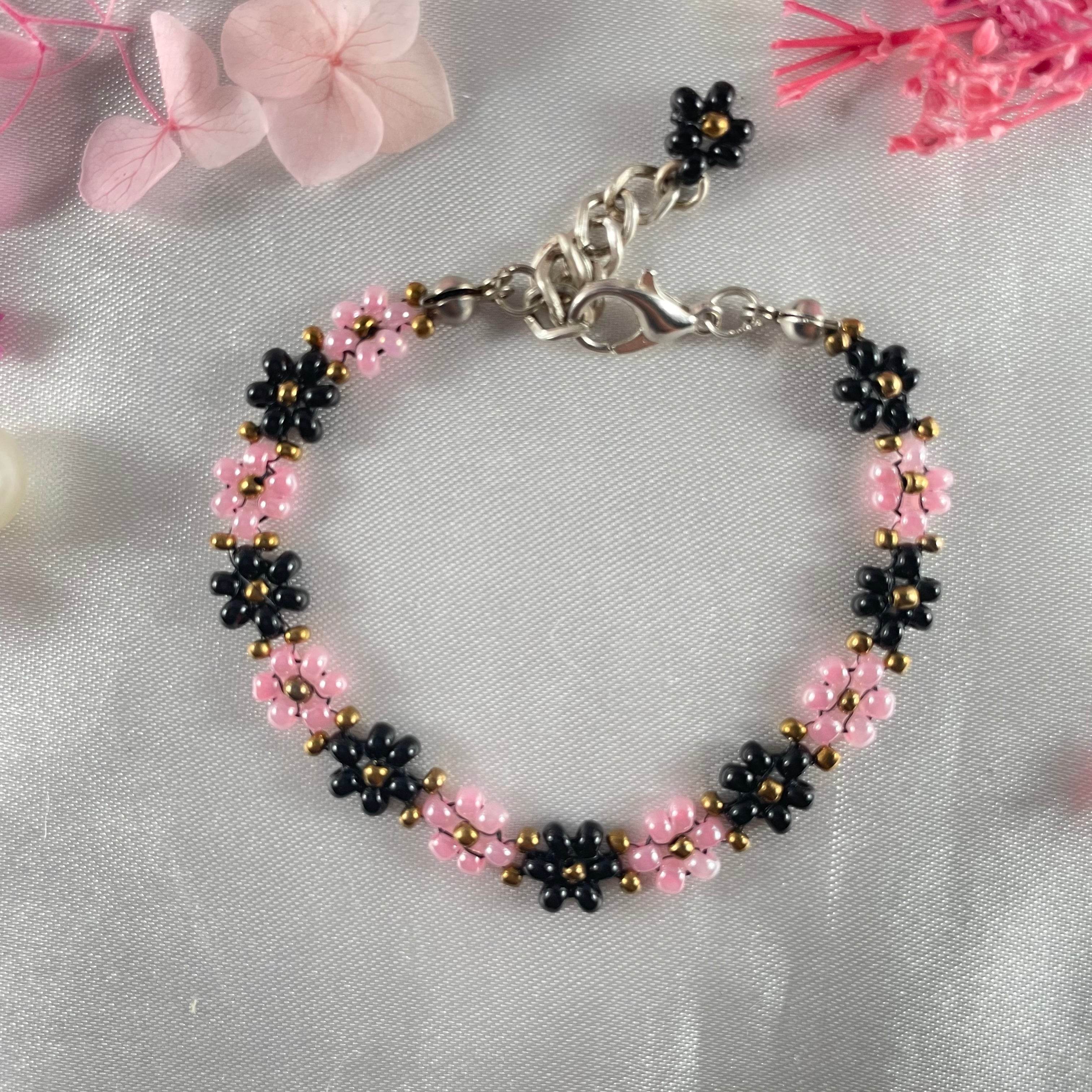 Daisy Flowers bracelet, made with rose Pink, and black Colour, Golden bead finishing - Fatatun