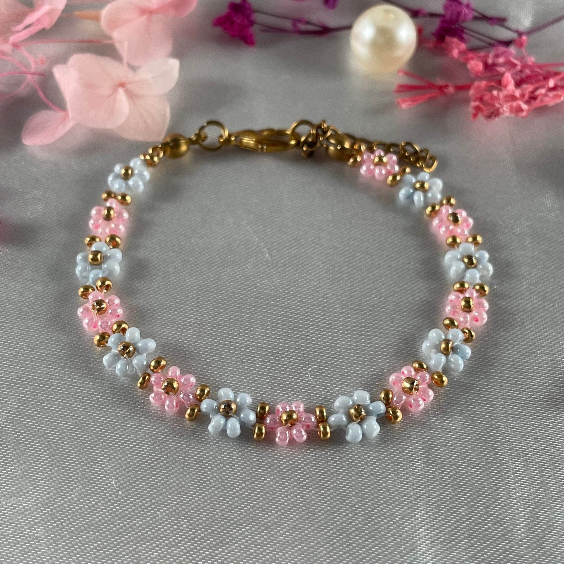 Daisy Flowers bracelet, made with Rose Pink and pastel blue Colour, Golden bead finishing - Fatatun