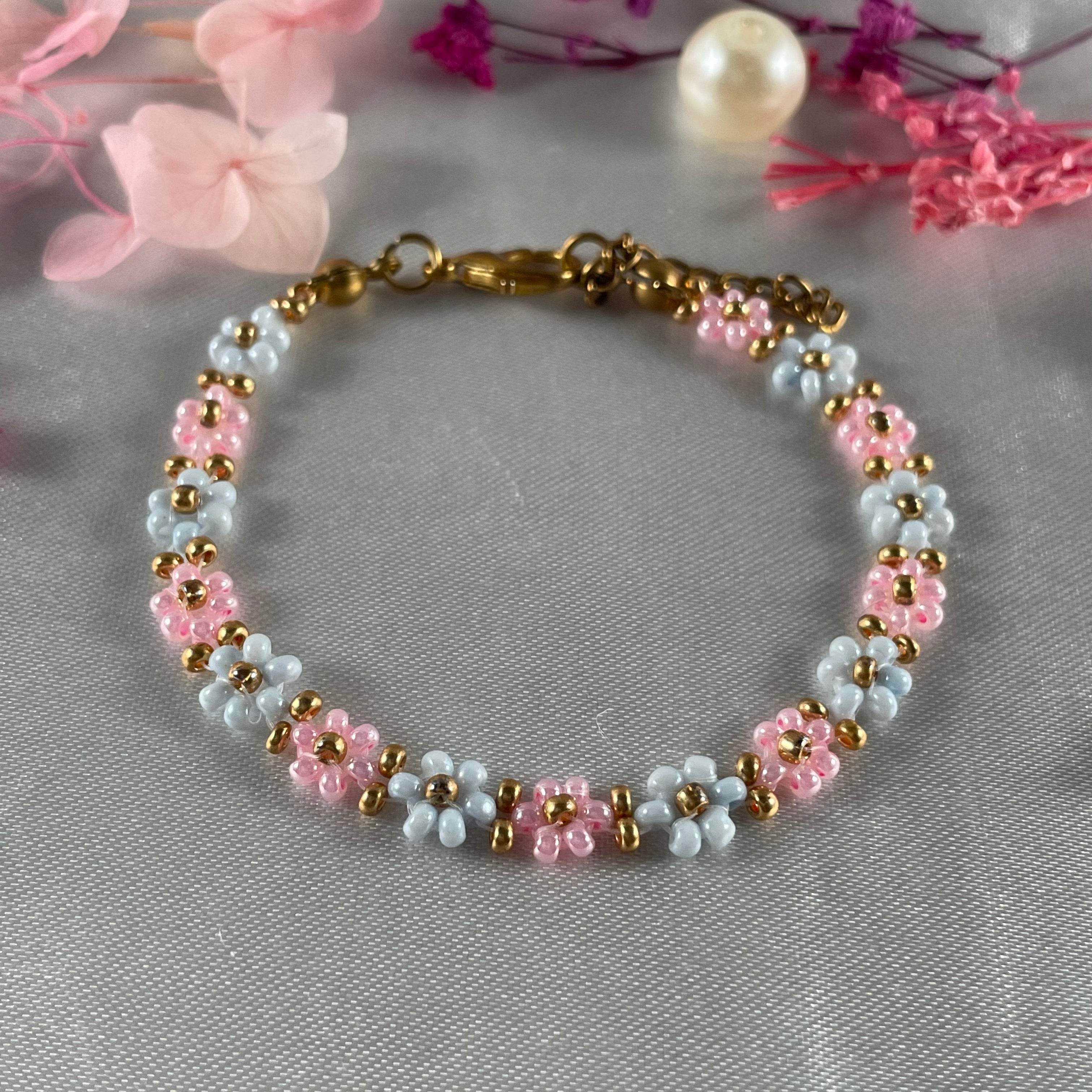 Daisy Flowers bracelet, made with Rose Pink and pastel blue Colour, Golden bead finishing - Fatatun