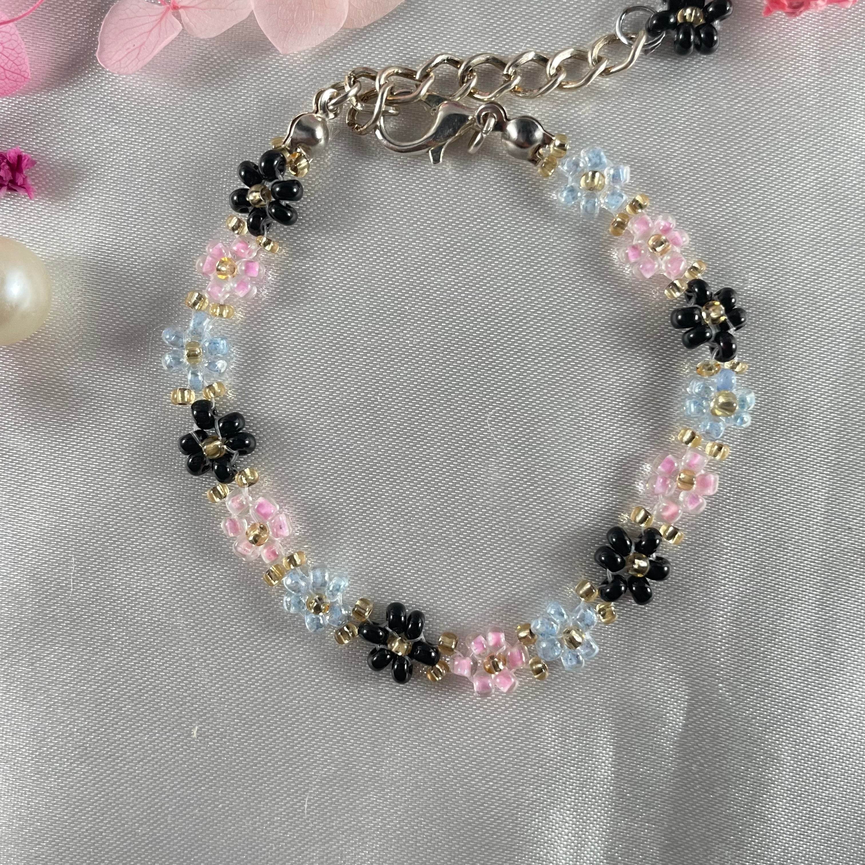 Daisy Flowers bracelet, made with rose Pink , Light Blue, black Colour, Golden bead finishing - Fatatun