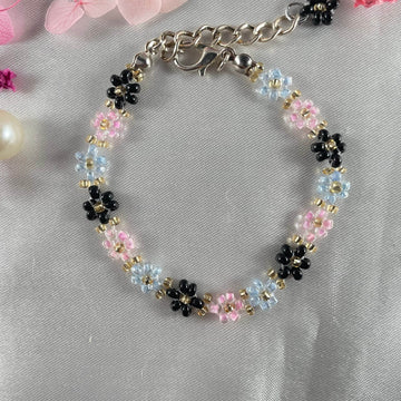 Daisy Flowers bracelet, made with rose Pink , Light Blue, black Colour, Golden bead finishing - Fatatun