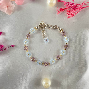 Daisy bracelet, made with Mauve Light Blue Colour, Golden finishing - Fatatun