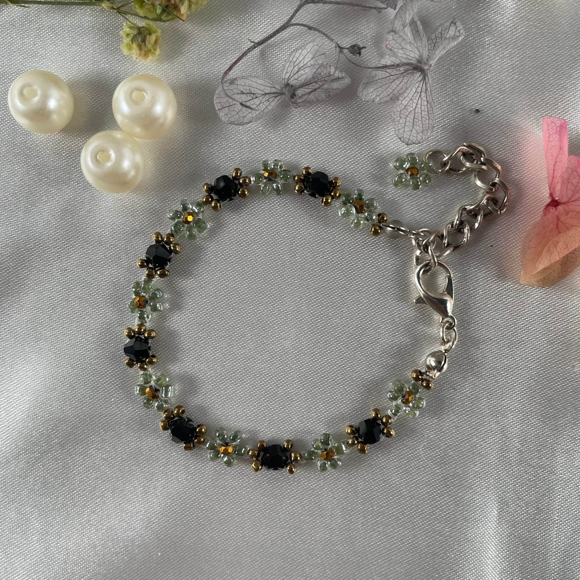 Daisy Flowers bracelet| colour Black Bicon Crystal and olive green, golden beads - Fatatun