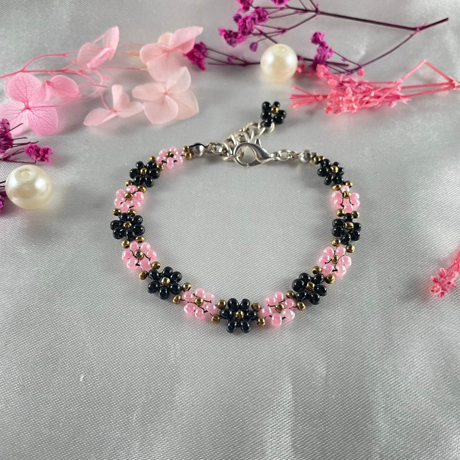 Daisy Flowers bracelet, made with rose Pink, and black Colour, Golden bead finishing - Fatatun