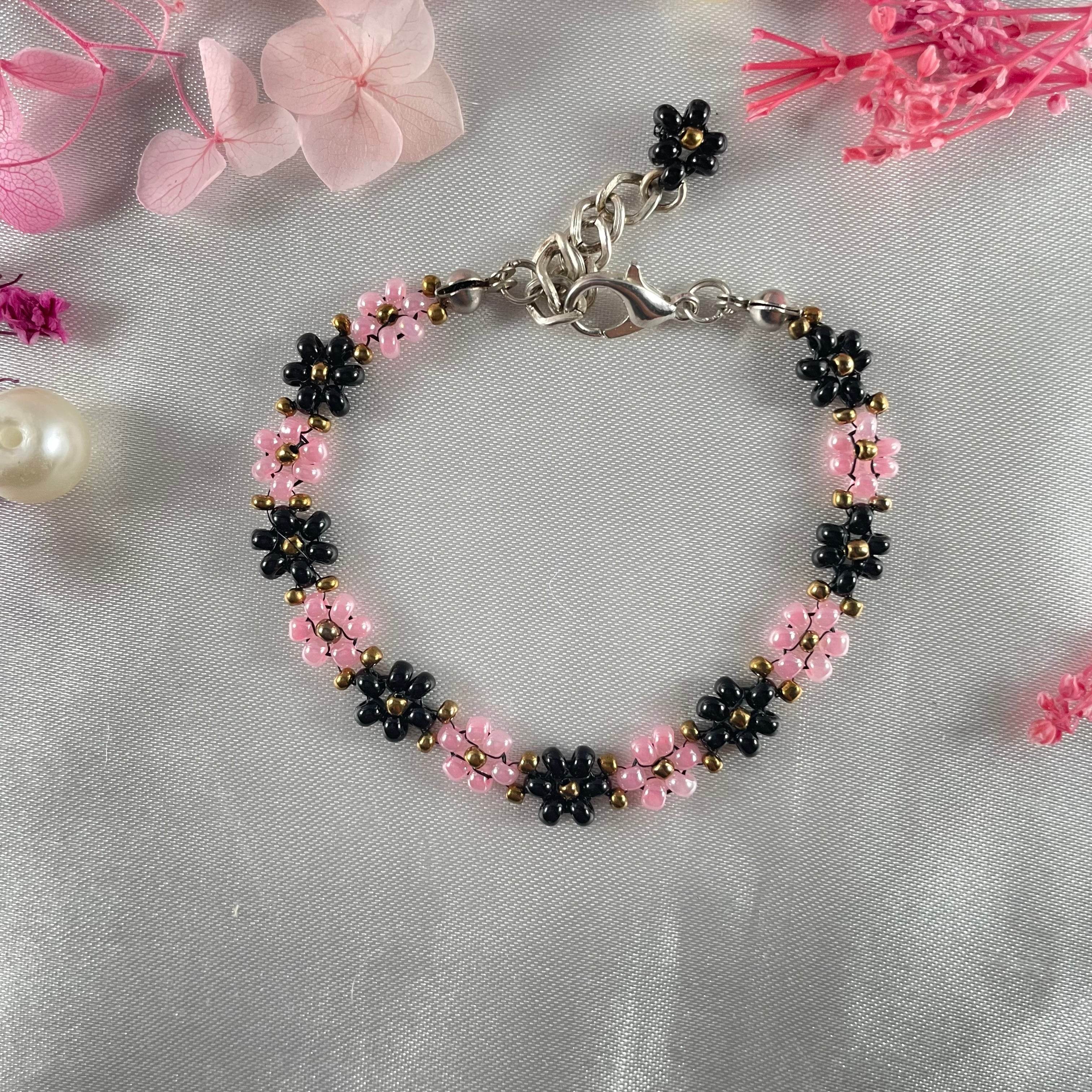 Daisy Flowers bracelet, made with rose Pink, and black Colour, Golden bead finishing - Fatatun