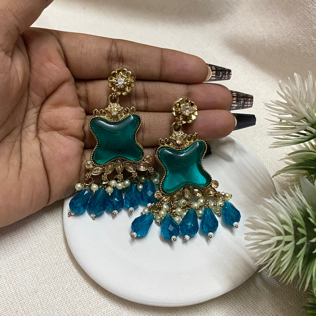 Golden heavy jhumka with mix of green and blue