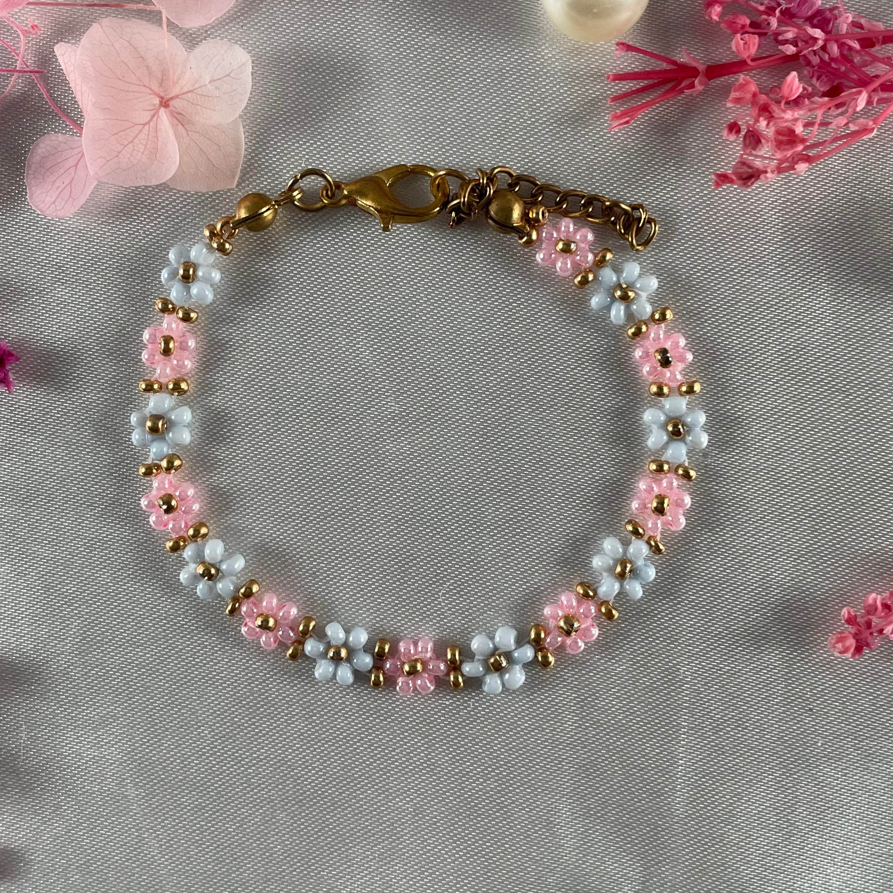 Daisy Flowers bracelet, made with Rose Pink and pastel blue Colour, Golden bead finishing - Fatatun
