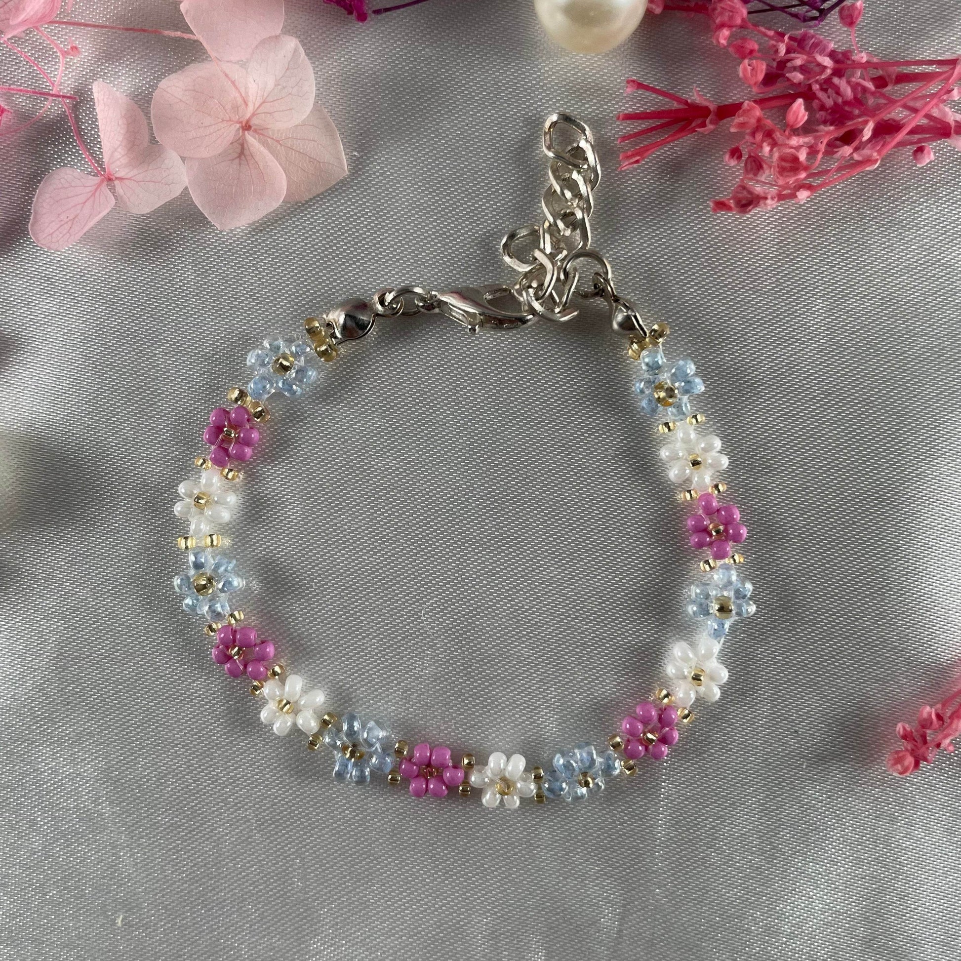 Daisy Flowers bracelet, made with Pastel Pink , Light Blue, White Colour, Golden bead finishing - Fatatun