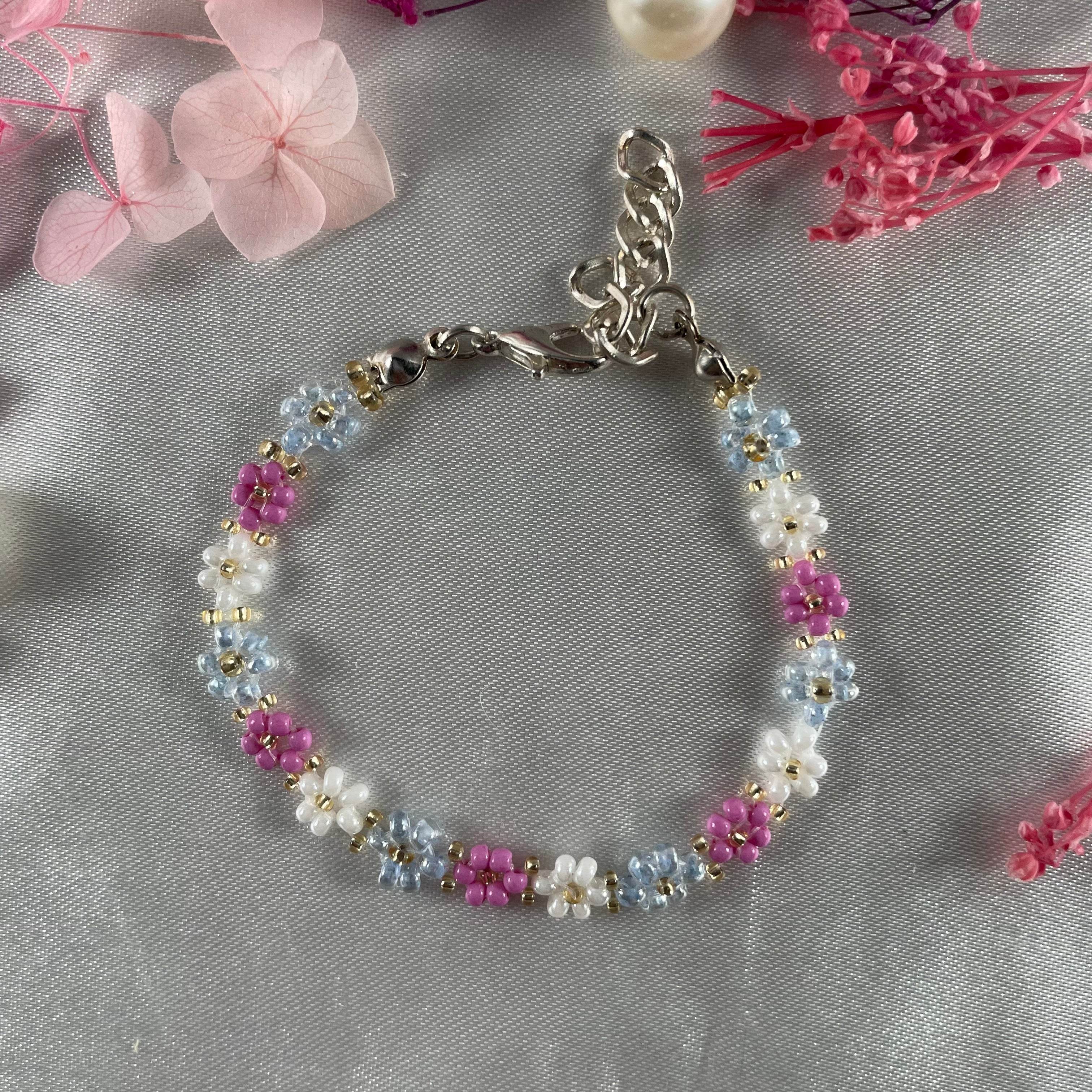 Daisy Flowers bracelet, made with Pastel Pink , Light Blue, White Colour, Golden bead finishing - Fatatun